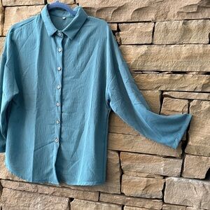 Teal Button-Up Shirt, No brand label. Polyester crepe fabric. Easy wear & care